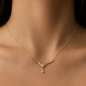 Gold-plated stainless steel necklace with a royal design, adorned with crystals and a zircon stone drop.