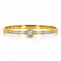 Stainless steel bracelet with a crystal emerald stone and a studded band.