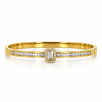 Stainless steel bracelet with a crystal emerald stone and a studded band.
