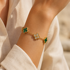 Gold-plated stainless steel bracelet with a lucky leaf design – green and crystal