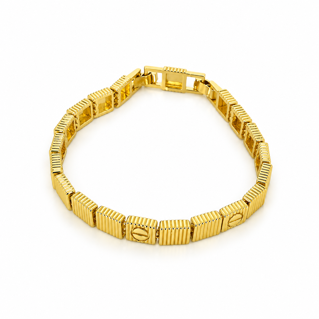 Gold stainless steel bracelet featuring a faceted cube design and screw engravings.