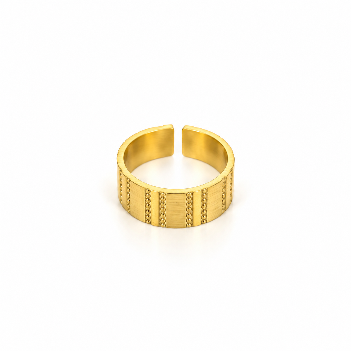 Open stainless steel ring with a wide surface and textured lines.