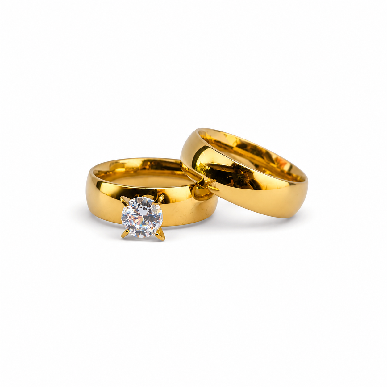 Twin ring set (wedding band and solitaire) in gold-tone stainless steel with a luxurious zircon stone