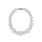 Silver stainless steel tennis bracelet featuring graduated rectangular zirconia stones.