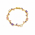 Italian gold-plated bracelet with a tulip branch design and colored zircon stones