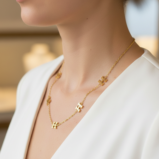 "Letters of Elegance" Necklace - Gold-plated stainless steel chain with a repeating letter H design