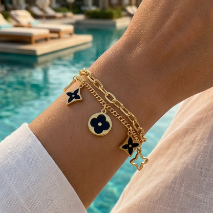 Double stainless steel bracelet with black geometric flower pendants