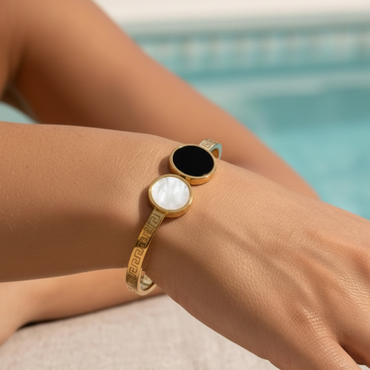 Stainless steel bracelet with gold plating and contrasting circles design - modern classic elegance