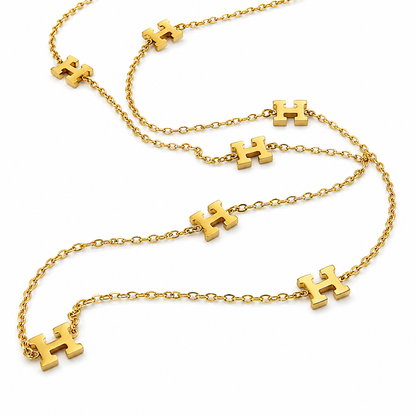 "Letters of Elegance" Necklace - Gold-plated stainless steel chain with a repeating letter H design